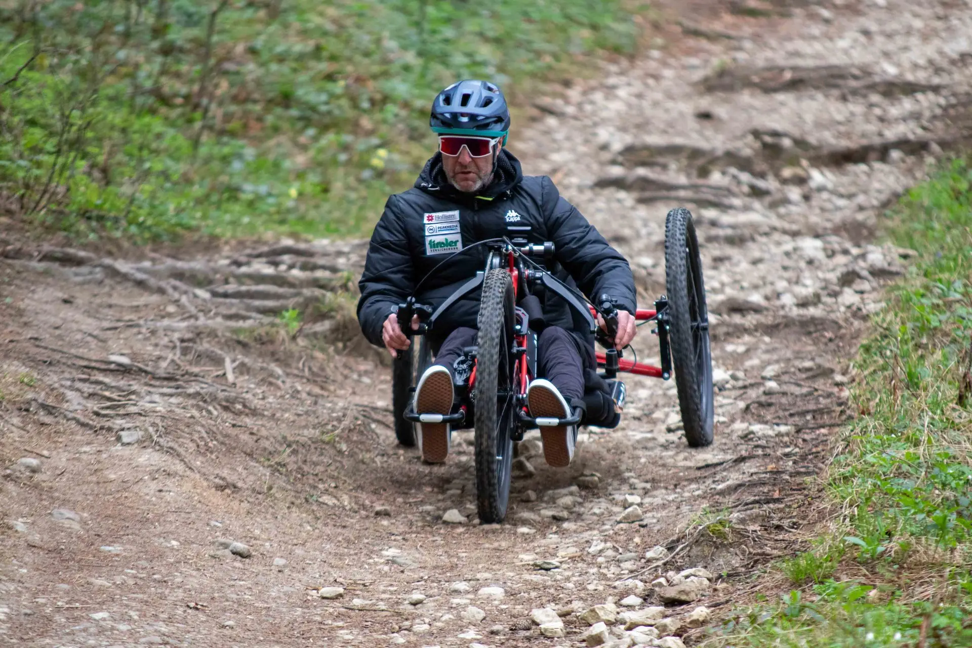 Praschberger IBEX handbike electrique tout terrain suspension independante